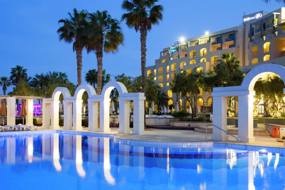 Hilton Malta | uses sustainable ecoturbino watersaving + energy saving bath and shower system